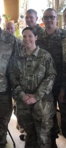 a photo of shelby ehrmann in army fatigues